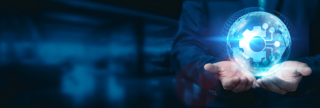 Businessman hold global vision, integrating globe with network connected to enhance, optimize, and leverage business development technology to integrate and streamline ideas.