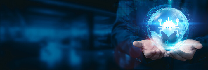 Businessman holds global threat intelligence globe with networks connected to cybersecurity platforms, industry sectors. Leveraging advanced threat intelligence to inform strategic business.