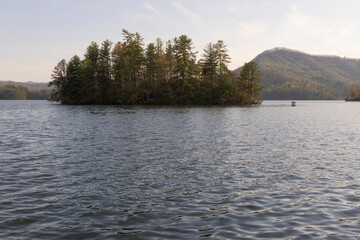 A scenic spring landscape view of Lake Santeetlah in the Nantahala National Forest in the mountains of western North Carolina. 