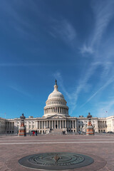 Fototapeta premium A symbol of Democracy. Capitol Building against blue sky, Washington, DC.