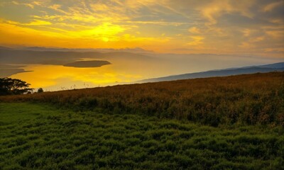 Obraz premium sunset over the field