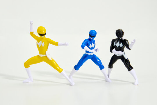 Figurines of colourful Power Rangers in studio