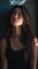 A woman with long hair wearing a black tank top and necklace. Generative AI.