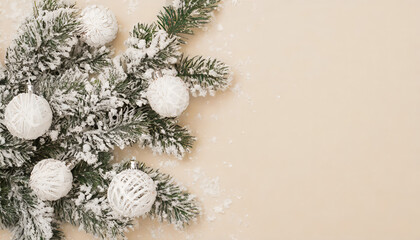 Fototapeta na wymiar Top view photo of christmas decorations snow covered branches on isolated beige background with copyspace 
