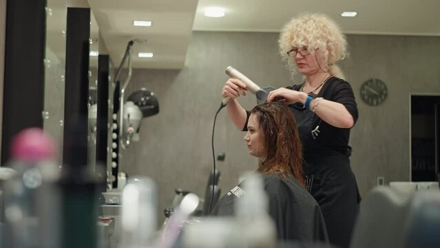 Beauty Procedures for Hair: Professional Haircut for Businesswomen. High quality 4k footage