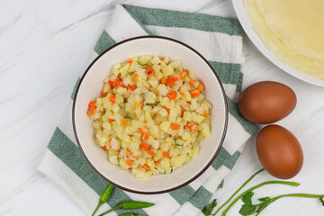 Ragout sayur for risoles filling, Indonesian traditional snack made from potato, carrot, and wrapped with soft crepe skin, bread crumbs and deep fry.  