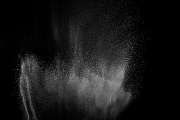 Abstract white dust on black background. Light smoke texture. Powder explosion. Splash water overlay.	
