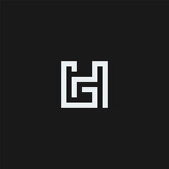 HG monogram logo in black and white.