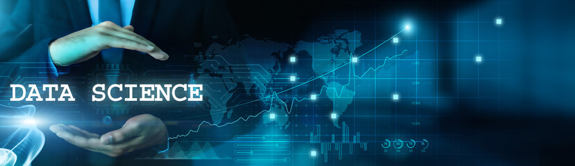 Data science and data analytics. Businessman hold data-driven business and analyze data with virtual network connection. Data science technology develops smart solutions.