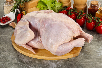 Raw whole chicken for cooking