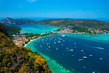 Sunset on Phi Phi Island, Thailand. Amazing paradise with turquoise sea and white beach, aerial top view