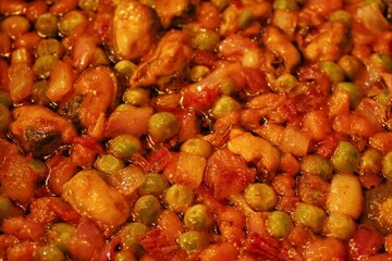 Stewed mussels with green pea and onion. Healthy homecooking. Pescetarian menu with vegetables. Balanced grocery food. Organic diet