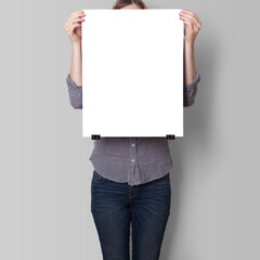 A Woman Holding an Empty Poster Mockup