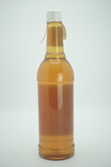 Bottle of honey in a glass jar