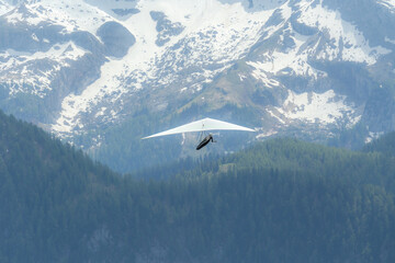 Hang gliding above mountain valley near Jenner mount Berchtesgaden National Park