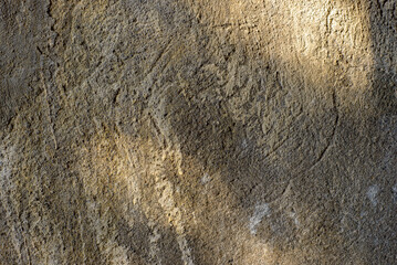 Cement wall with cracks, dirt, scratches and moisture stains. Textured background.