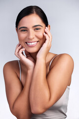 Fototapeta premium Beauty, portrait and woman with happiness in skincare, dermatology and mockup in studio background. Confidence, model and girl with self care for skin, facial cosmetics or healthy texture on face