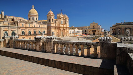 Piazza del Duomo (Duomo Square) in Noto, Syracuse, Sicily, Italy, with Basilica Minore di San Nicolo (Cathedral of St Nicholas) on the left