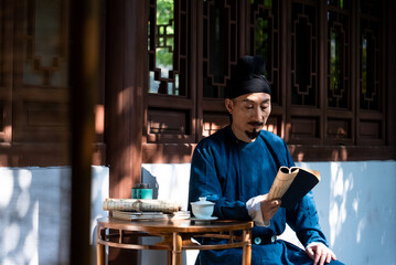 ancient person reading book