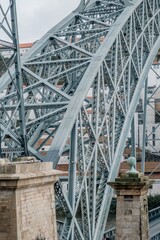 A close-up of the Dom Luís I Bridge in the old town of Ribeira, Porto, Portugal. Fragment of a metal railway bridge between Oporto and Nova Gaia - 789066311