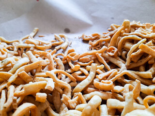 Onion sticks or onion cakes or known as Kue Bawang in Indonesia, are a snack with a savory and crunchy taste. Eid Al-Fitr dishes.