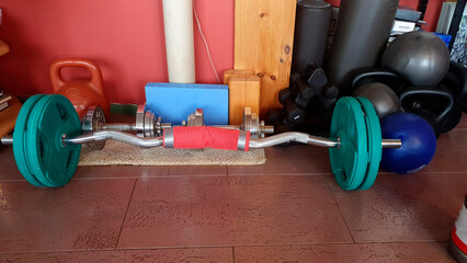 athlete's home set, barbells, weights and dumbbells