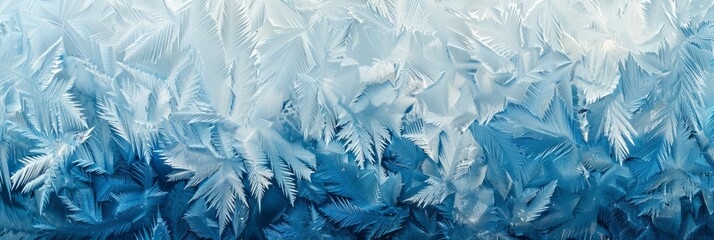 Subtle shades of blue and white highlight the delicate ice crystal formations on a frosty winter window creating an abstract pattern - Powered by Adobe