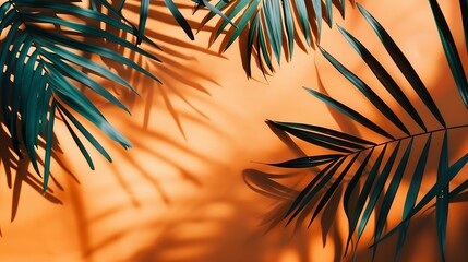 Tropical shadow on orange background Tropic palm leaf overlay on thanksgiving and halloween...