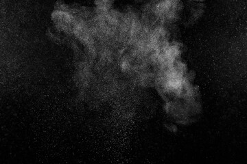 Abstract dust overlay texture. White particles on black background. Powder explosion.	
