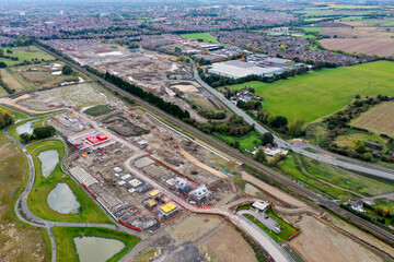Aerial photo of a construction building site building houses, taken in Leeds in the UK showing a...