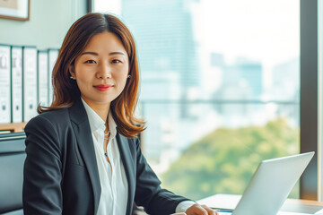 Portrait of a beautiful Asian business woman in the office