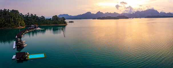 Aerial view of Khao Sok national park at sunrise, in Cheow lan lake, Surat Thani, Thailand - obrazy, fototapety, plakaty