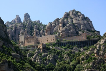 Montserrat monastery on mountain in Barcelona, Catalonia. - obrazy, fototapety, plakaty