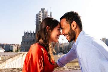 Fototapeta premium Multiracial beautiful happy couple of lovers dating in Barcelona