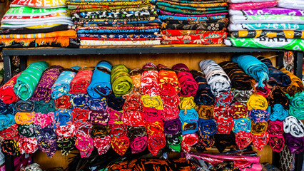 Bali March 2024 - Colorful sarongs on sale in the markets in Bali, Indonesia. - obrazy, fototapety, plakaty