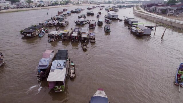 Flight over the Big Cai Rang Floating Market in Asia, Vietnam, Mekong river Delta, Can Tho, in the morning