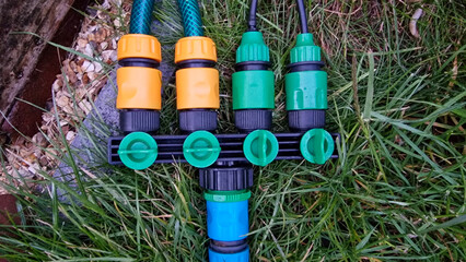 Close up of a garden hose multi attachment