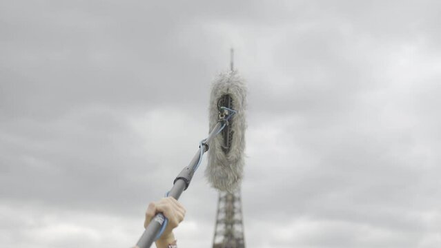  Sound Recordist Holding Microphone On Video Film Production In Paris background