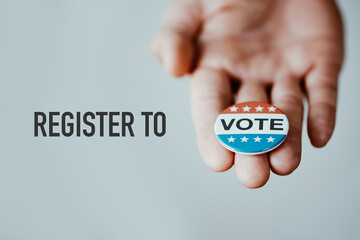 text register to vote, with a vote badge - 789130977