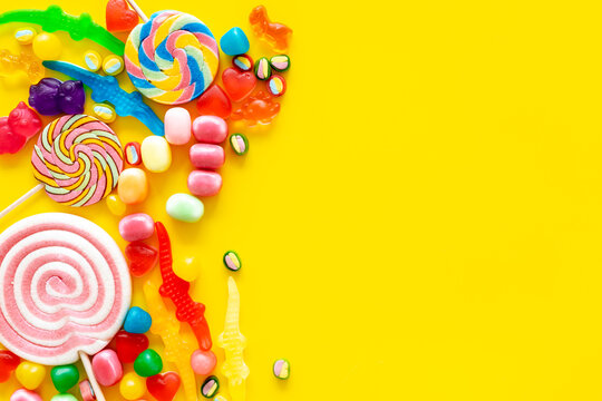 Set of colorful candies and lollipop. Sweet food and candies background