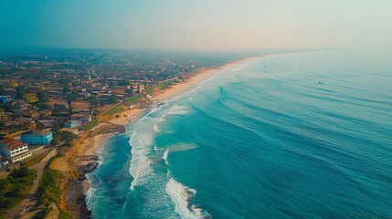 Aerial view of Accra, urban expanse and coastal line, sunny afternoon - obrazy, fototapety, plakaty