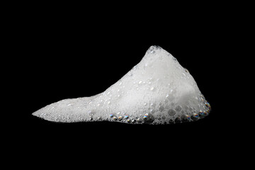shampoo bubble isolated on a black background, white foam soap. concept of suds texture, foam...
