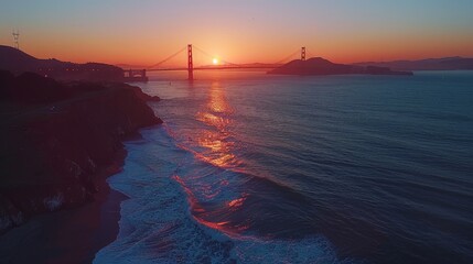 Aerial view of San Francisco with the Golden Gate Bridge at sunset