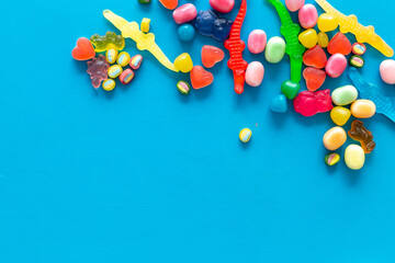 Food pattern. Sweets and candies background. Many different lollipops top view