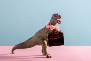 Cute dinosaur with flower necklace and vintage suicase on pink and blue background.