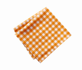 Folded checked yellow tablecloth isolated on white.Picnic orange cloth,dish towel,food decor.