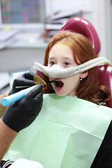 Anesthesia for children in dental treatment. Nitrous oxide for pain relief of child. Treatment of...