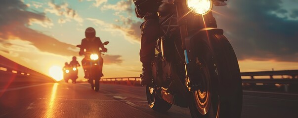Front view of the motociclist ride in the sunset. Rider on the road. - obrazy, fototapety, plakaty