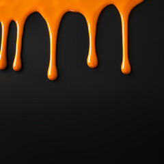 orange paint on black background