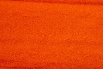 Orange paper texture with copy space. Paper background.